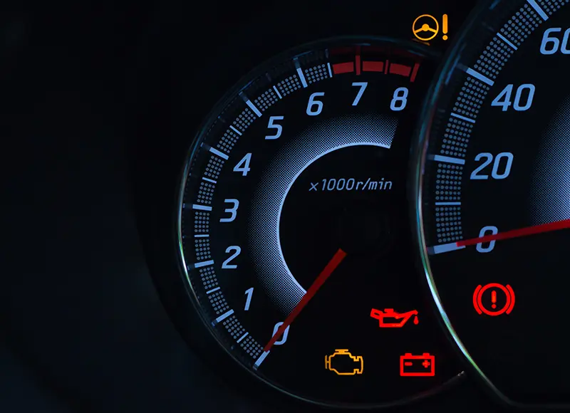 Car dashboard with check engine light